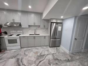 The 40 Minnacote Avenue Basement Residence