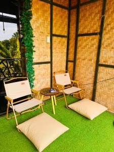 Native Eco Hut - Air-conditioned Family rooms by MC RENTALS SIQUIJOR
