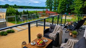 Złota Plaża Apartament Kwiecisty z widokiem na jezioro