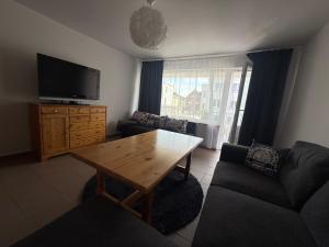 Nowy dwupokojowy apartament 65 m , 5 minut spacerem od plaży , parking