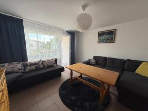 Nowy dwupokojowy apartament 65 m , 5 minut spacerem od plaży , parking