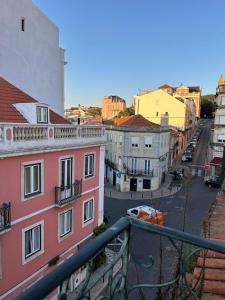 Cozy room with a view of the 25 de Abril Bridge