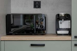 Stylish Apartment with Parking and Balcony by Noclegi Renters