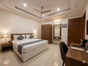 Hotel Capital Home & Apartment Rooms Near Maxx Hospital