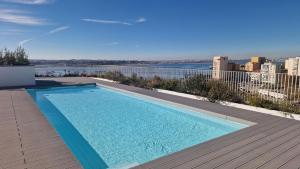 Vista Tejo com Piscina - garagem e ar condicionado