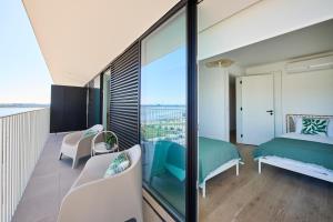 Vista Tejo com Piscina - garagem e ar condicionado