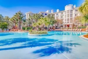 LaSata beauty with patio pools hot tubs fitness center AC & beach access