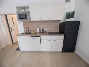 See 3 - Schönes 2-Zimmer Appartement mit Parkplatz und privatem Seezugang