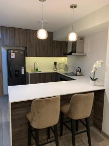 Moderno Departamento en San Isidro - Ubicación Premium, WiFi y Confort