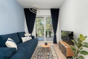 Stylowy Apartament z Klimatyzacją i Parkingiem Blisko Plaży by Noclegi Renters