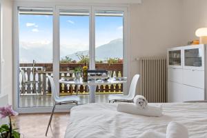 Charmant studio avec superbe vue et balcon