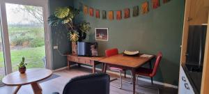 B&B Even Heukelom - Kamer met Tuin