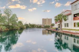Water-view studio with pool central AC tennis & sauna