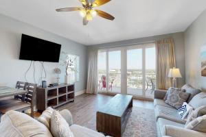 Inviting waterfront condo with pool hot tub beach access balcony & WD