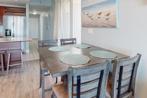 Inviting waterfront condo with pool hot tub beach access balcony & WD