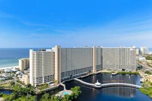 Inviting waterfront condo with pool hot tub beach access balcony & WD