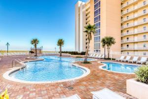 Beach home with balcony Gulf views & shared pool hot tub