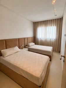 Elegant 2 Bedroom Apartment with Pool View & Balcony