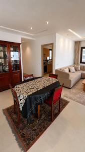 Elegant 2 Bedroom Apartment with Pool View & Balcony