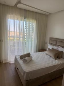 2BR Apartment with Pool & Secure Parking