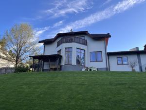 Modern house near a forest on the border with Riga