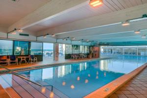 Gorgeous beachfront condo shared pool and beach access