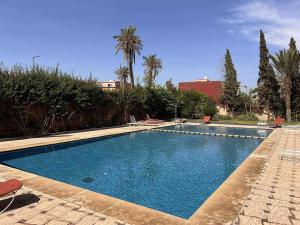 Cozy Gueliz Flat with Pool, AC & Wi-Fi