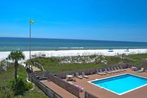 3rd-floor beachfront condo with Gulf views outdoor pool balconies WD & AC
