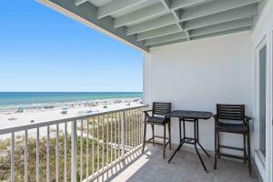 Bright Gulf-front condo with two balconies pool central AC & WD