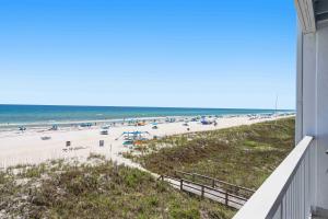 Bright Gulf-front condo with two balconies pool central AC & WD