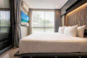Suite Vista 1BR Rooftop Pool Citygate Kamala