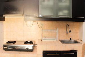 Homey and Comfort Living 2BR at Mediterania Palace Apartment By Travelio