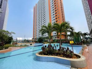 Apartemen Green Pramuka City by Erna