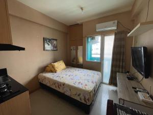 Apartemen Green Pramuka City by Erna