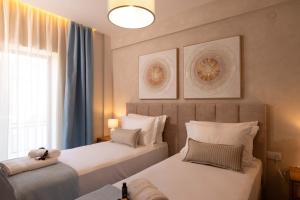 OURANOS Coastal Suites