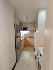 MACTAN NEWTOWN CONDO with pool access