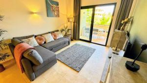 Luxury apartment with terrace and pool views on golf resort