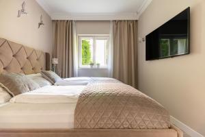 Sanhaus Apartments - MOLO 2 - apartament z ogrodem i parkingiem 3 min od plaży
