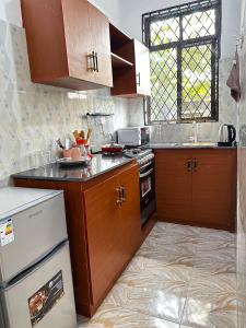 Ayesiga Luxury Stays-Cozy King Suite II, Makumbusho