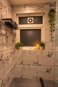 Cozy Marble Studio Premium 1BHK Stay in Gurgaon