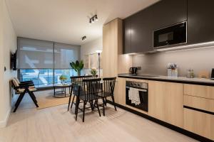Modern 2BR2BA Prime Las Condes Escape for 4 Guests