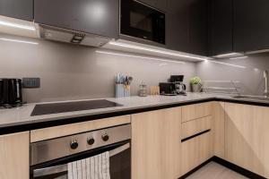 Modern 2BR2BA Prime Las Condes Escape for 4 Guests