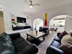 Urogallos Poolside Retreat 2BR, 2 Baths & Shared Pool
