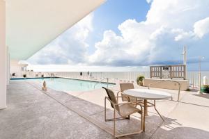 Inviting Gulf-front condo In Perdido Key with waterfront pool hot tub and oceanfront balcony