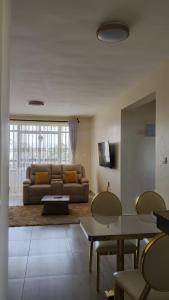 Gold and Elegant Ravic Homes Shawmut Suites with a Pool and Gym