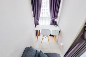 Nice and Elegant Studio near Campus at Pacific Garden Alam Sutera Apartment By Travelio