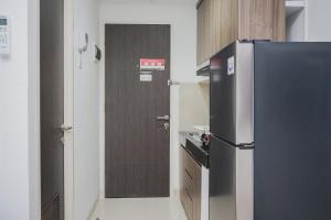 Homey and Comfortable Studio at Serpong Garden Apartment By Travelio