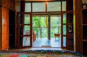 Tat Tvam Asi Organic Farm Stay - Minivet