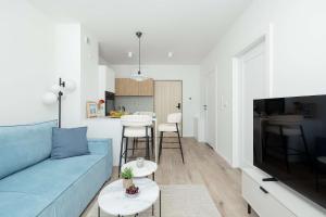 Sunny Apartment with a Balcony & Parking Near the Beach in Międzywodzie by Noclegi Renters