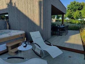 Nature Lake Village – Villa Timberly n°16 – 8 personnes avec jacuzzi
